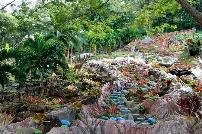 Admission to Andoke Butterfly Center in Cali with Release Ritual - The butterfly garden enclosure: sit still and let it happen