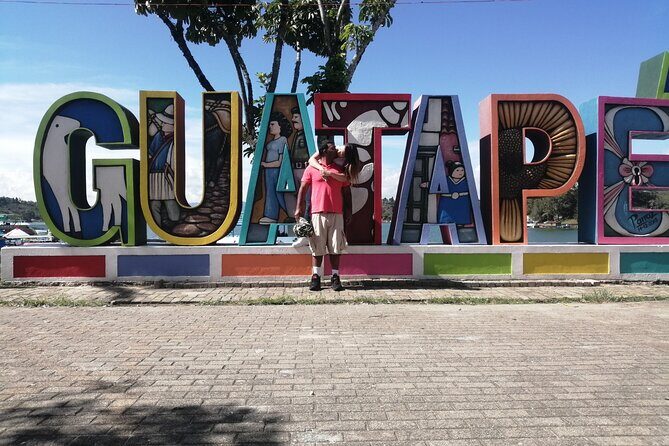 Amazing Private Guatape Tour + Boat Ride + Helicopter & Rock - Malecon de Guatapé: Stories While You Walk the Waterline (2 Hours)