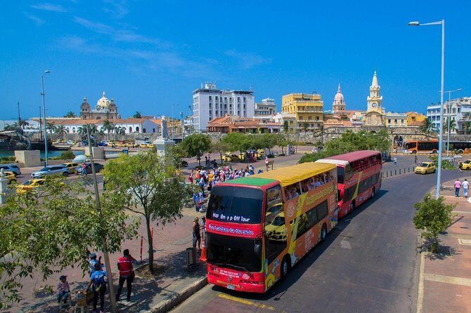 Cartagena: City Tour Hop On Hop Off - Bus Turistico de 2 pisos - Old City return route: Torre del Reloj, Plaza de Bolívar, and museum stops