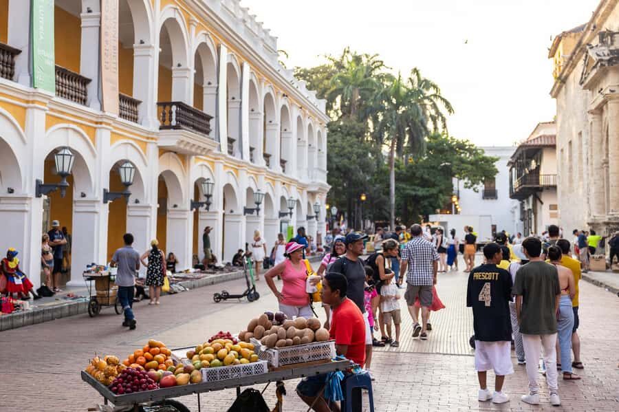 Cartagena: Guided Street Food Tour with Tastings - The walk through Cartagena: walled city first, then Getsemaní