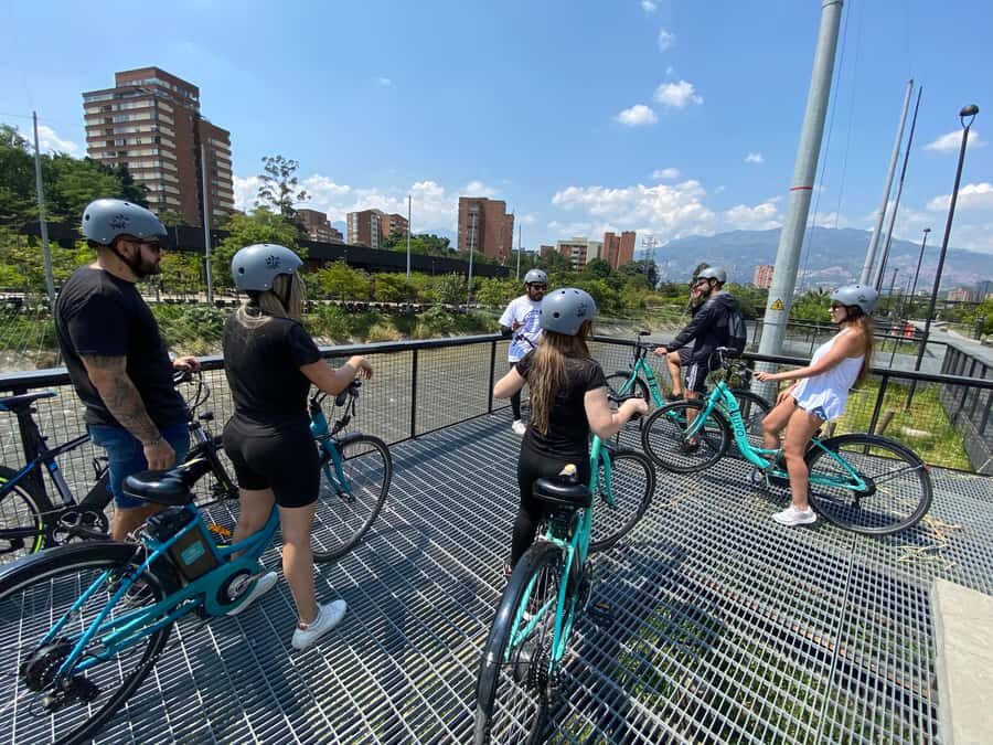 E-Bike City Tour Medellin with Local beer and Snacks - Starting at San Joaquín Church: your easy meeting + first local details