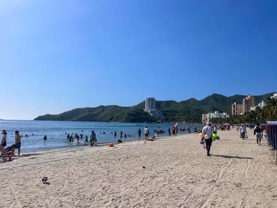 From Cartagena: Barranquilla & Santa Marta Guided City Tour - Malecón walks and football tributes: Sharks Fin, Junior, and Pumarejo Bridge