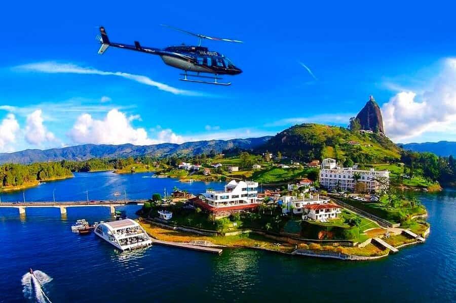 Medellín: Guatapé Private Tour with Helicopter & Boat Ride - Private Boat Ride on the Reservoir: Slower Views, Real Water Smell