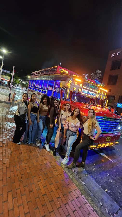 Medellin: Party Bus with DJ & Street Food Tastings - DJ energy plus a guide who keeps it social