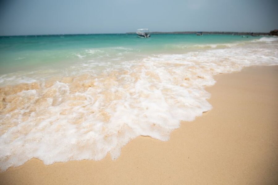 Playa Blanca Full-Day Trip from Cartagena - Getting to Playa Blanca: transfer timing and how the beach gets less crowded